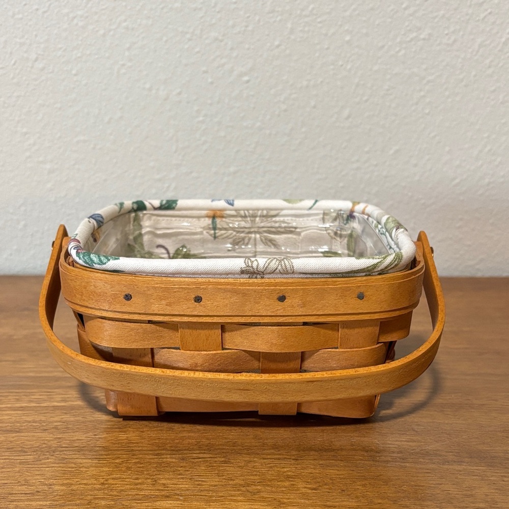 Longaberger Small Berry Basket with protector, liner, and product tag.